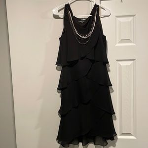 Black dress with necklace attached